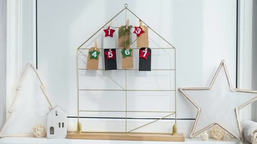 Decorating an Advent Calendar with Christmas Ornaments