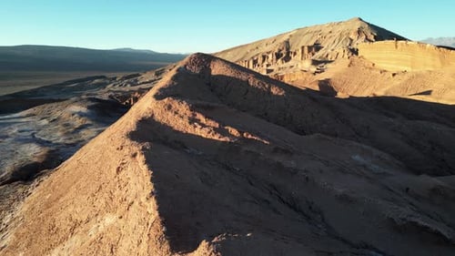 Drone Shot of Valle de la Luna with Long Desert Shadows at Sunset
