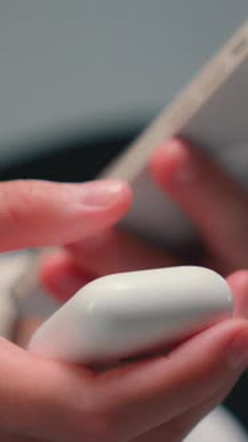 Cropped View Unknown Woman Holding Mobile Phone Open Case with Headphones Problem with Musical