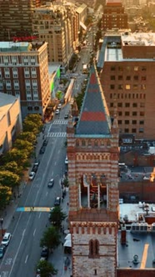 Golden hour in Boston, Massachusetts, USA. Drone flying above the tower of Old South Church.