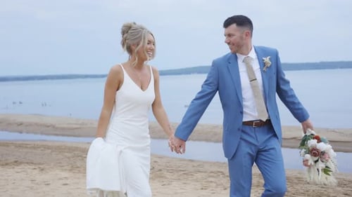 Love captured as the couple gazes into each other’s eyes by the sea