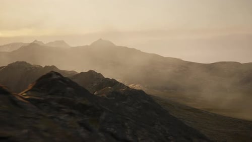 Rocky Mountain Peaks During Golden Sunset Sky