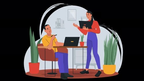 A man and woman collaborating in a modern office setting.