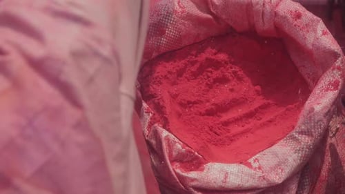 A Man selling red powder