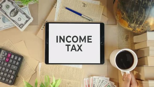 INCOME TAX DISPLAYING ON FINANCE TABLET SCREEN