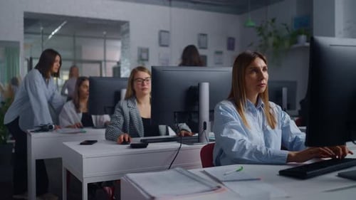 Office Of Modern WebDesign And Marketing Research Company Female Workers Sitting In Workplaces