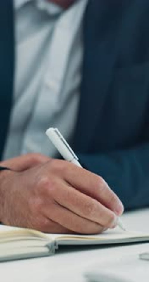 Hands, writing and notebook at office for checklist, schedule or reminder at investment company