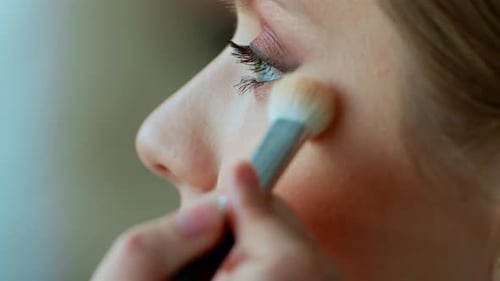 Makeup Artist Work in Her Beauty Studio Portrait of Woman Applying By Professional Make Up Master