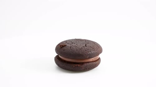 Chocolate Sandwich Cookie Still Life on White