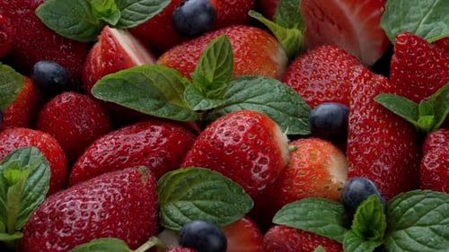 Fresh Strawberries, Blueberries, and Mint Close-Up