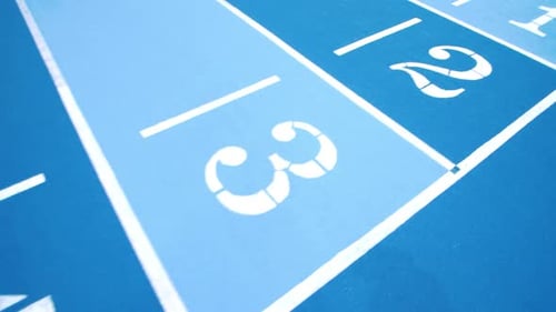 Blue Running Track Lanes at Sports Stadium