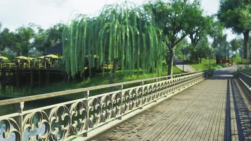 Serene River Setting Surrounded By Lush Trees and Tranquil Pond Scene