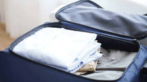 Trip, Travel, Vacation, Luggage and People Concept - Close Up of Male