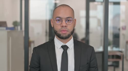 Young Adult Man in Suit and Tie