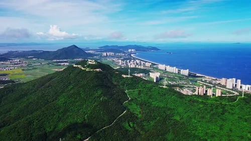 Aerial Top view of a transparent blue sea with beautiful waves at sunny day in summer. air of ocean
