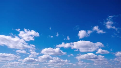 Timelapse of Cumulus Clouds Moves In The Blue Sky