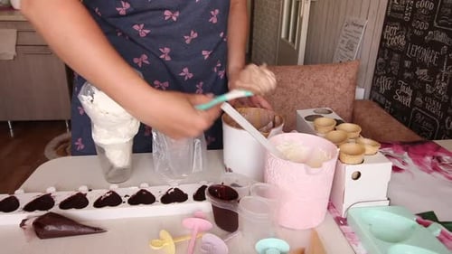 Woman Prepares Desserts in a Home Kitchen
