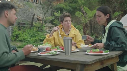 Friends Eating Lunch Together Outdoors