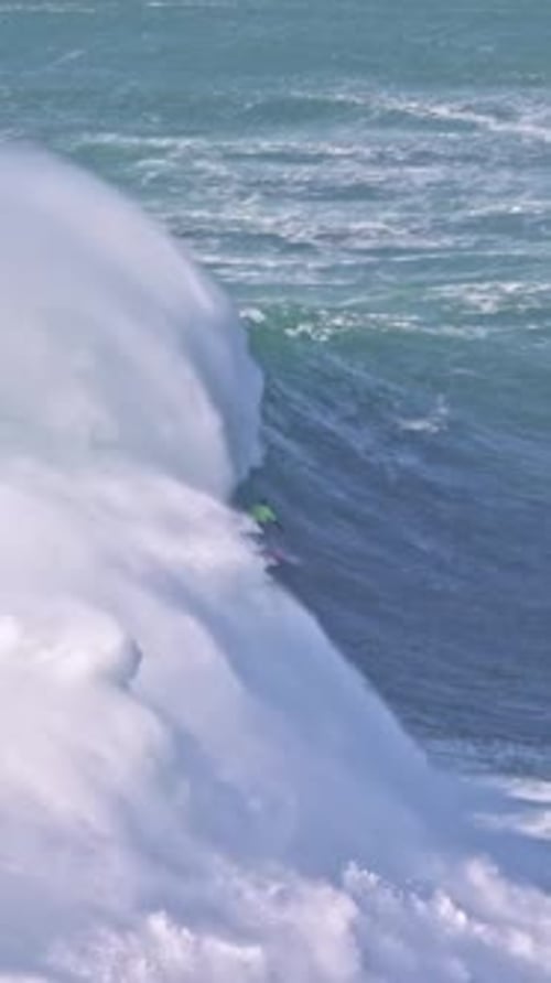A Man Surfing the Sea Waves