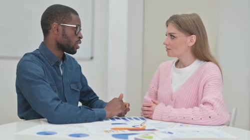 Close up of African man Talking Woman in Meeting