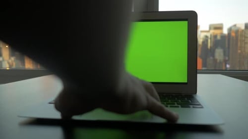 Computer Screen Isolated on GreenScreen Background Chroma Key in City Office