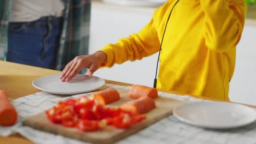Cute Afroamerican Boy Child Wearing DJ Headphones Using Plates Instead of Sound Mixer Performing