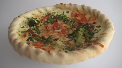 View Rotating Appetizing Pizza Background