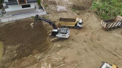 Ground Prep Aerial View of Construction Site Soil Unloading