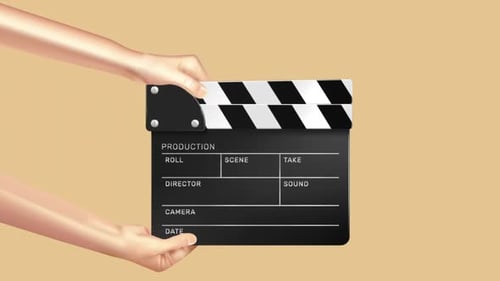 Movie Clapperboard With Hand