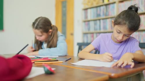 Group of young boy and girls enjoy to learn or study in drawing classroom also some paint in school