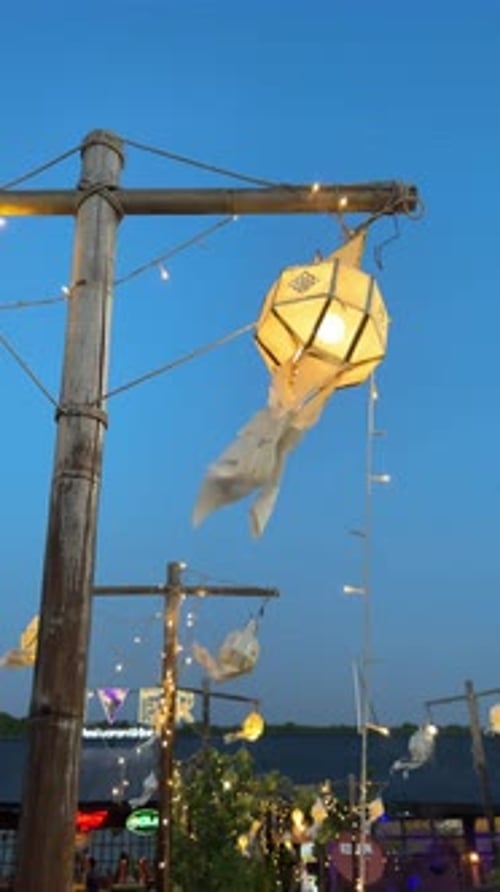 Glowing Chinese Lanterns Hanging on a Pole