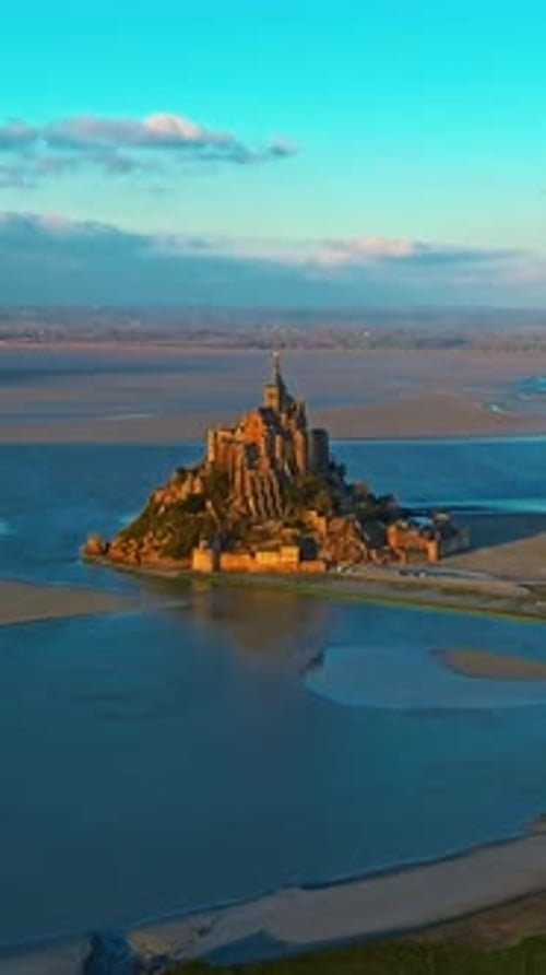 Aerial View of the Famous Historic Abbey Mont Saint Michel Historic Monastery with Tidal Flats