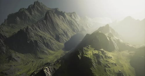 Majestic Mountain Range with Lush Green Valleys Under Sunlight