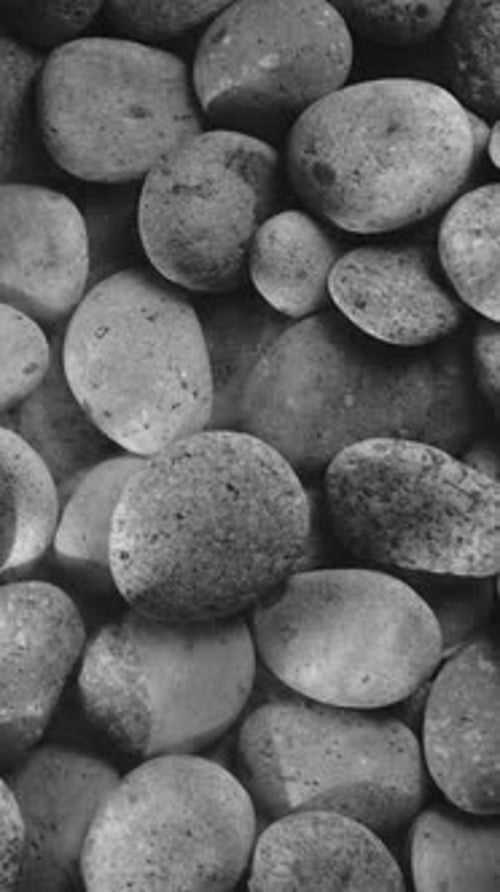 Vertical Black and White River Stones with Soft Mist