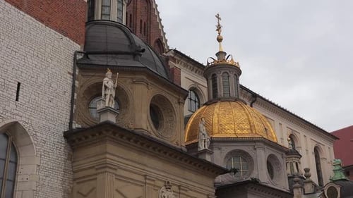 Historic royal Wawel castle in Cracow, Krakow, Poland. Golden roof.
