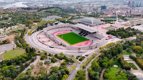 Aerial drone view of FC Barcelona football stadium. Greenery around, Barcelona, Spain