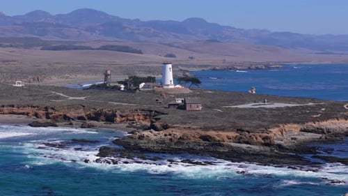 Coastal Lighthouse View from Above on Sunny Day