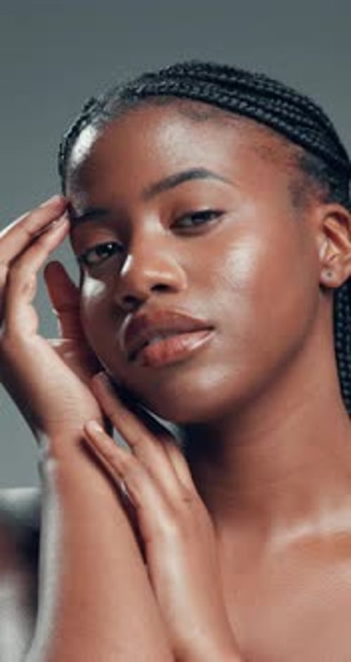 Face, skincare and wellness with black woman in studio for body care, cosmetics or dermatology