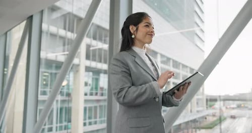 Tablet, walking and business woman in office online for communication, networking and planning