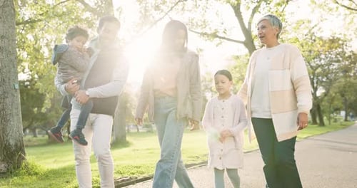 Nature, bonding and family on a walk in a park for fresh air, exercise and conversation together
