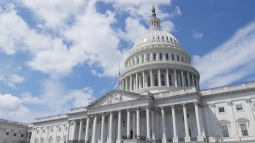 Dome of United States Capitol Building against blue sky, Washington D.C. National Mall