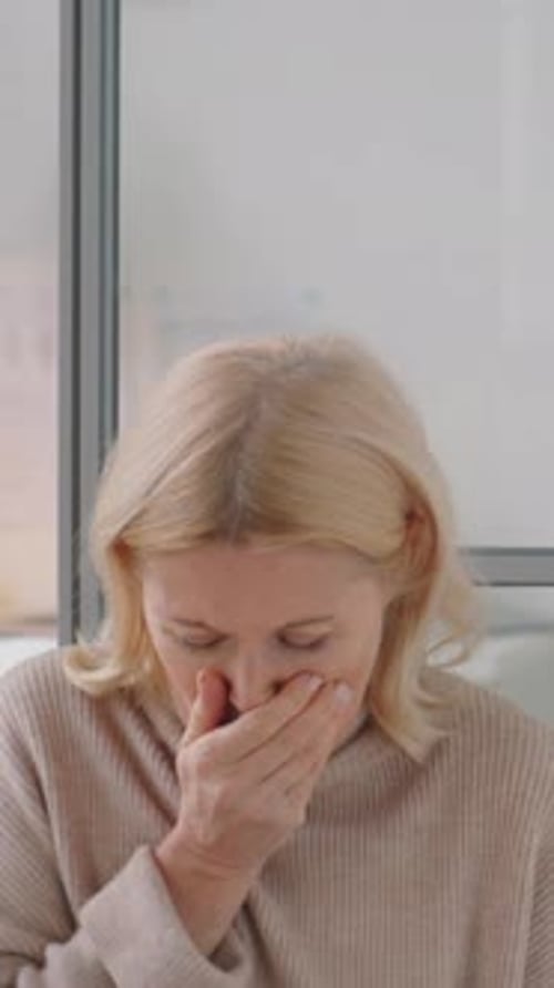 Woman, Suffering from Coughing, Waiting for Doctor Appointment in Hospital