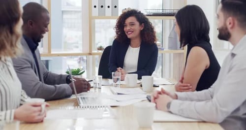 Diverse Team Meeting in Bright Modern Office
