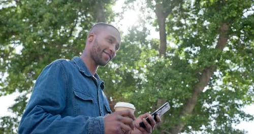 Park, texting and man relax with coffee, happy and calm in nature for travel