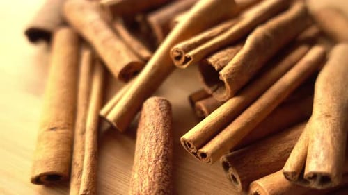 Cinnamon Sticks Rotate As a Background Cinnamon Closeup Spices with Cinnamon