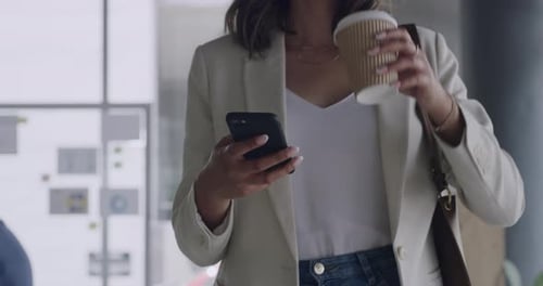A confident business woman arriving at the office with copy space