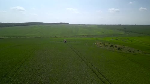 Spray Fertilize On Field With Chemicals In Agriculture Field