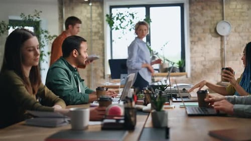 Group of Adults in an Office Meeting