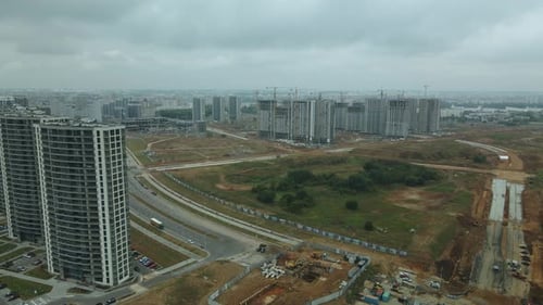 Construction site of a new city block. Construction of multi-storey buildings.