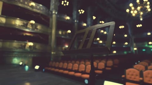 Theater With Rows of Seats and Lights